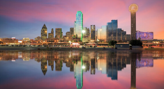 Dallas, Texas cityscape with blue sky at sunset, Texas